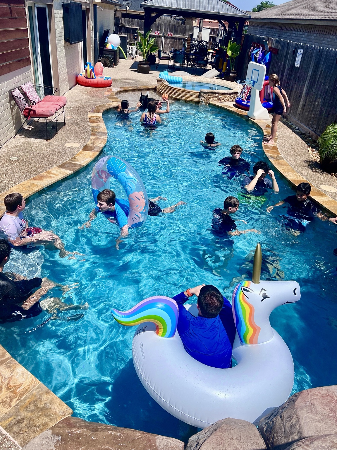 Children enjoying a real pool party at Cypress River Oasis