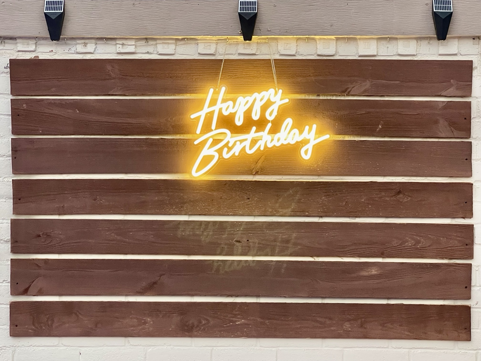 Light-up Happy Birthday neon sign included with the Birthday Package