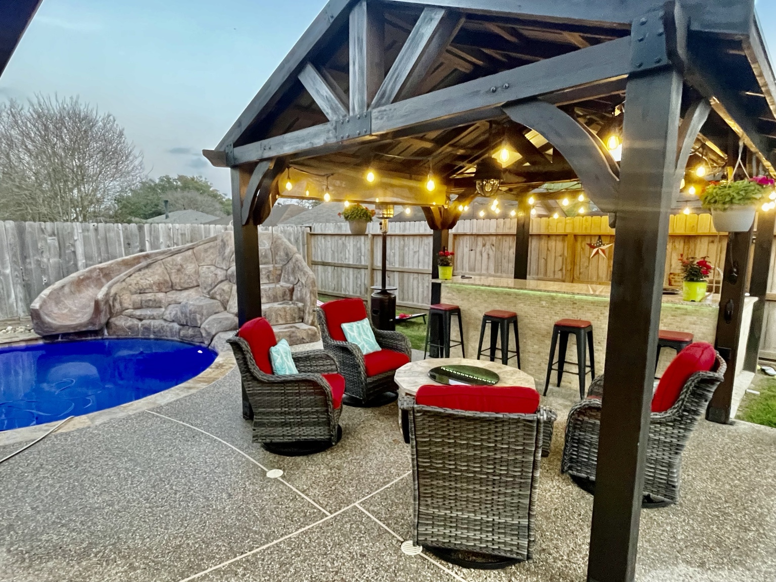 Pool beneath large shade sails