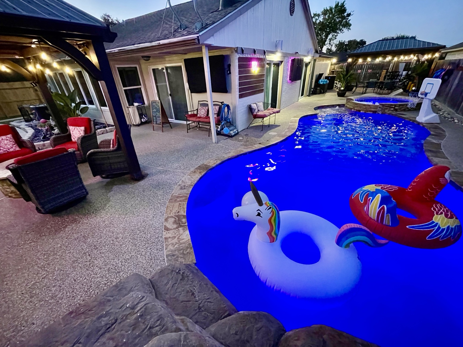 Night pool with floats