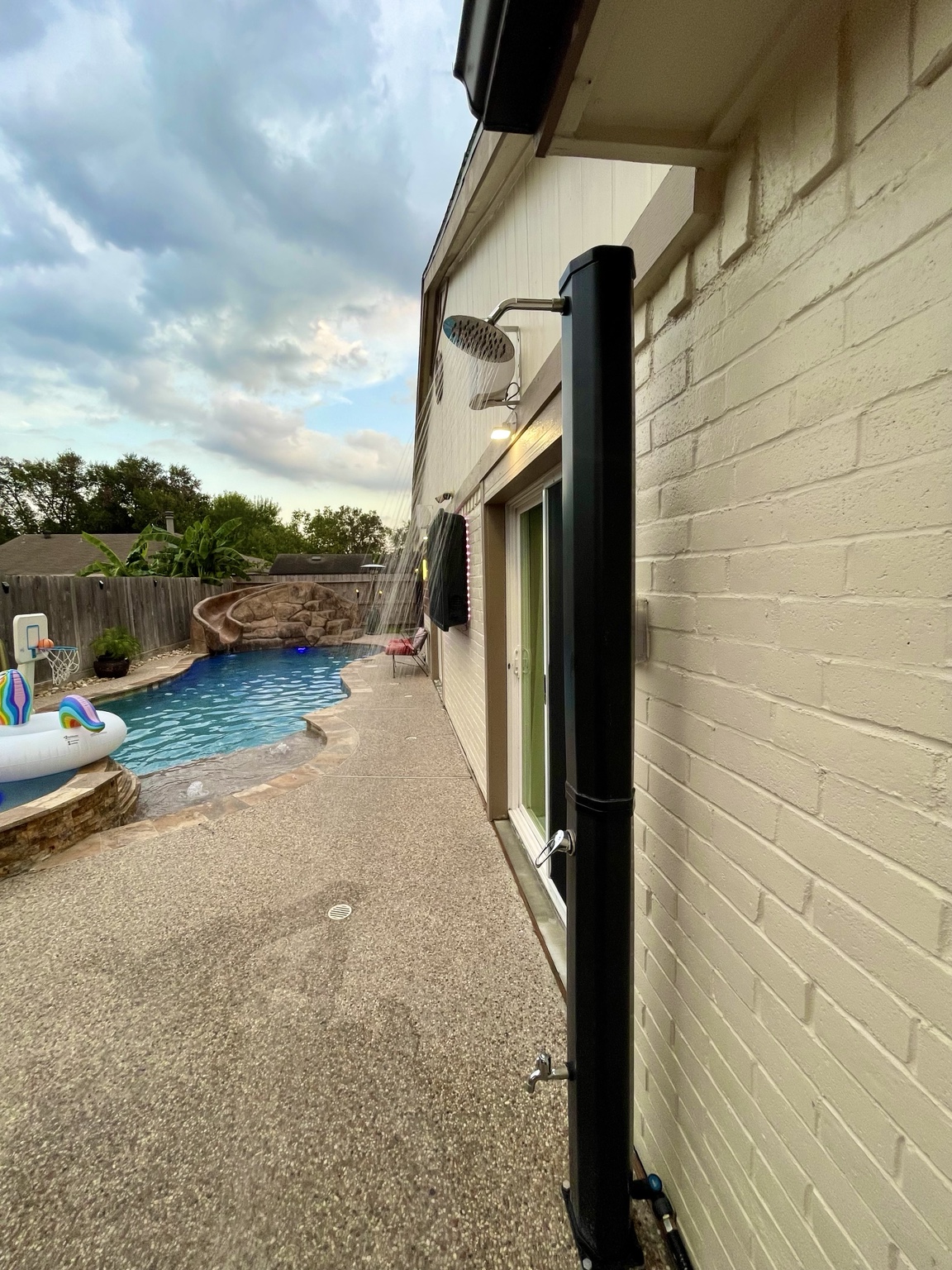 Outdoor shower beside the pool